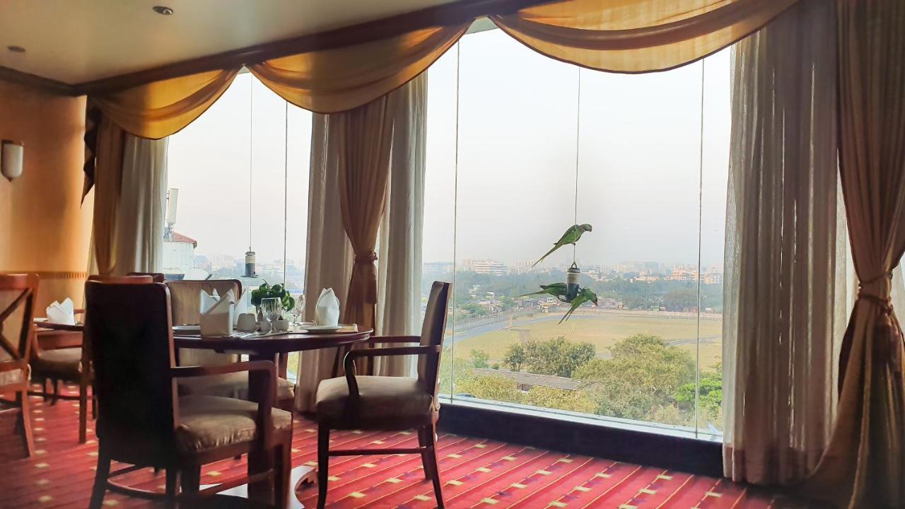 The Orchid Hotel Mumbai Vile Parle Luaran gambar Parrots at the hotel